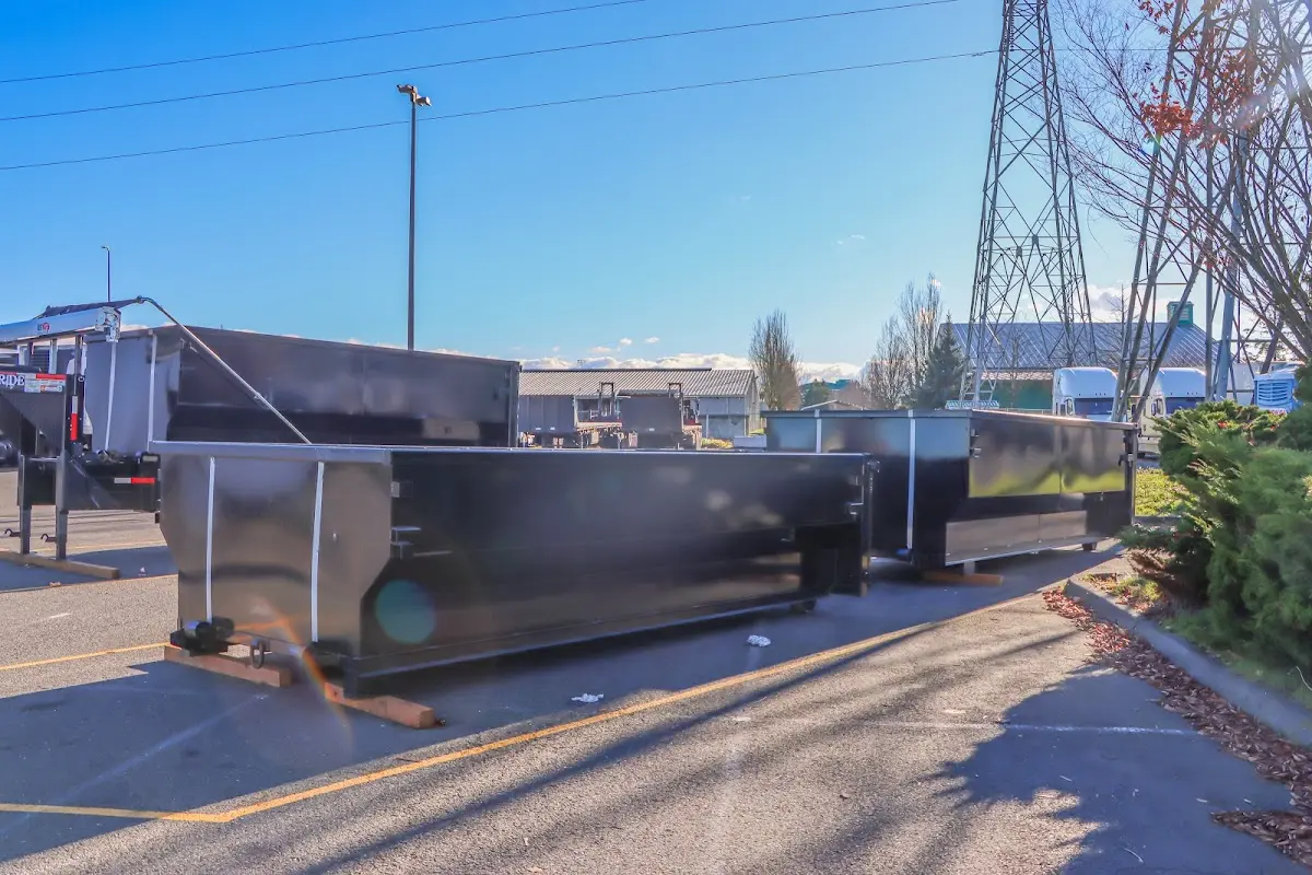 Roll-off dumpster ready for waste disposal at job site for Concrete Dumpster Rental in Titusville
